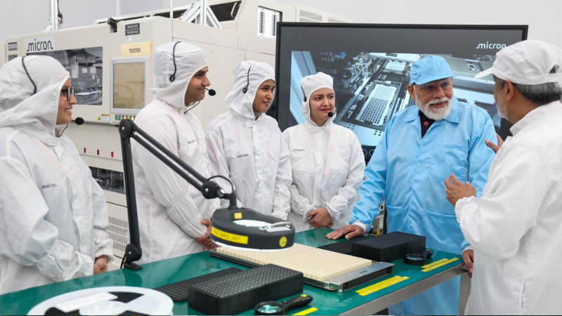 Indian Prime Minister Narendra Modi at Micron Tech Semi-conductor assembly plant in Sanand of Gujarat, with experts.