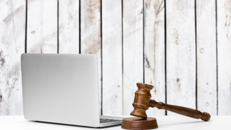 A laptop and a gavel