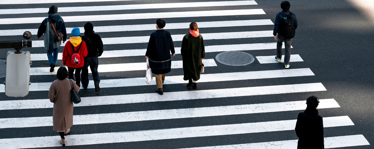 People walking on a zebra crossing