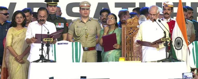 Kerala Chief Minister VD Satheesan taking oath as the 13th Chief Minister of the state at the Raj Bhavan ceremony.