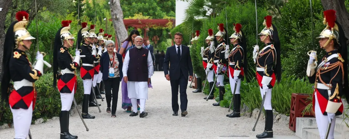 Narendra Modi and Emmanuel Macron walk past a French ceremonial guard during India-France engagements at Bharat Innovates 2026 in Nice France on June 15, 2026