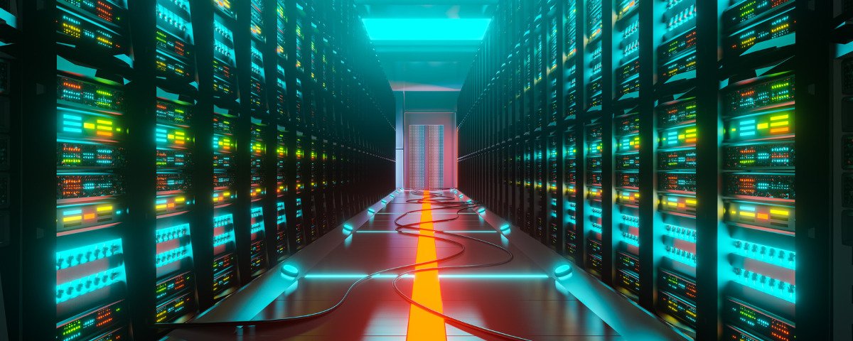 Rows of server racks inside a large data centre supporting cloud and AI infrastructure.