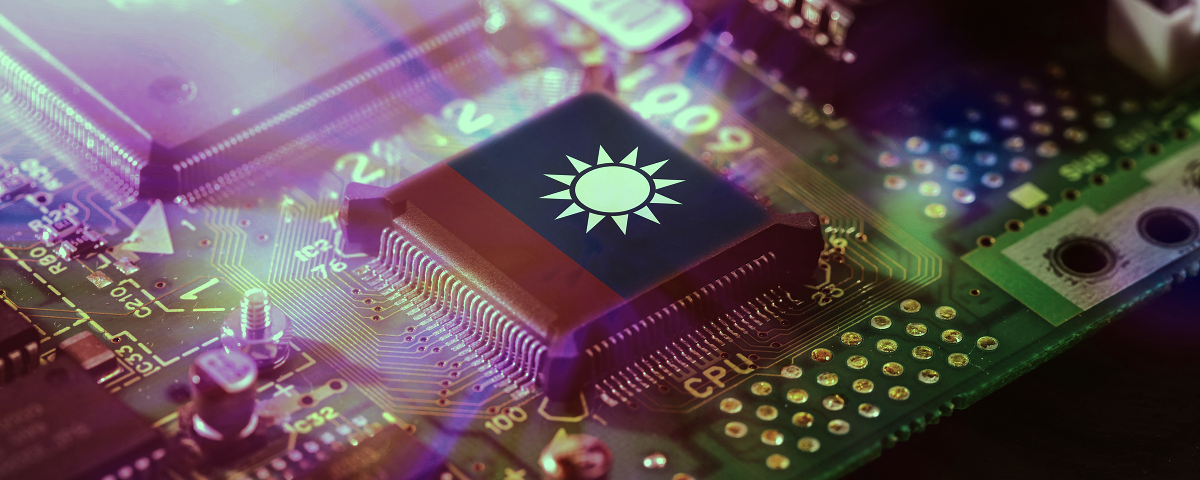 Taiwan flag displayed on a semiconductor chip mounted on a circuit board.