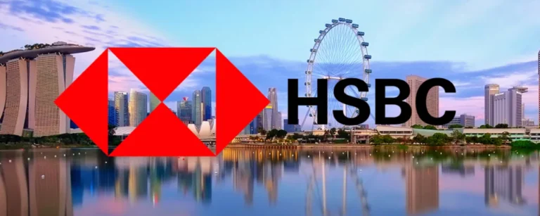 HSBC logo displayed over Singapore's Marina Bay skyline, representing the bank's Global AI Center of Excellence and plans to hire more than 100 AI specialists in Singapore.