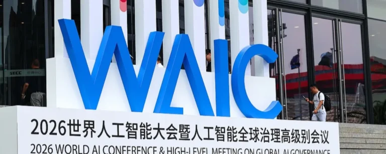 Blue WAIC signage outside the Shanghai Expo Centre at the 2026 World Artificial Intelligence Conference.