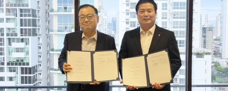 Daniel Chung, President of Corban Energy Group, and Han Juseog, Head of HD Hyundai Heavy Industries Engine & Machinery Business Unit, pose holding signed contract documents for the $673.8 million HiMSEN engine power systems deal for U.S. data centers.