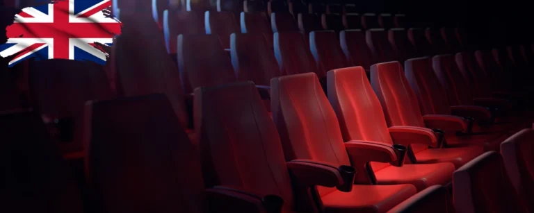 UK cinema auditorium with a graphic of the British flag, illustrating restrictions on Meta AI smart glasses over piracy concerns