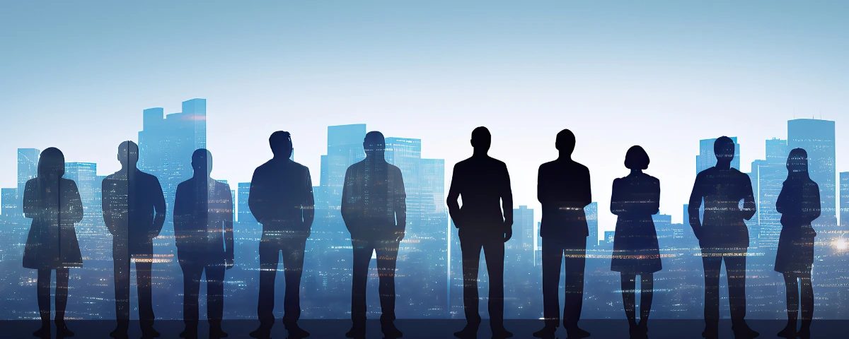 Illustration showing silhouettes of professionals standing against a city skyline.