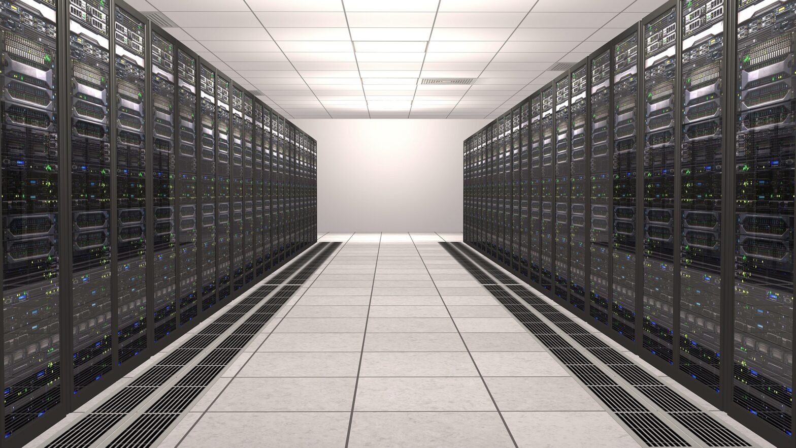 A modern data centre aisle lined with rows of black server racks on both sides, filled with blinking indicator lights and networking equipment, extending toward a bright vanishing point.