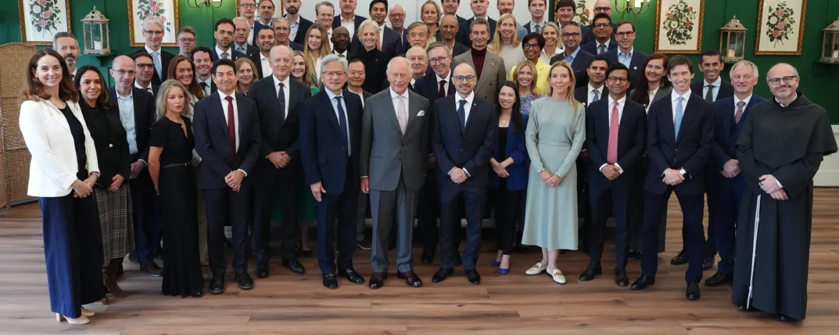 King Charles III standing with AI industry executives and UK officials at the AI Summit at Dumfries House in Scotland