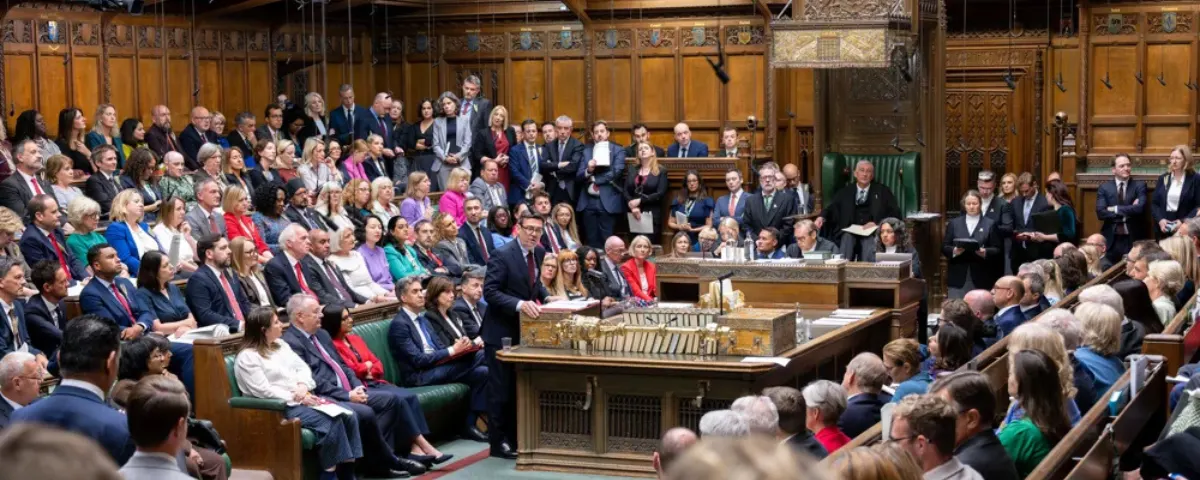 UK Parliament chamber during a session, representing the Joint Committee on Human Rights’ call for stronger regulation of artificial intelligence in the UK.