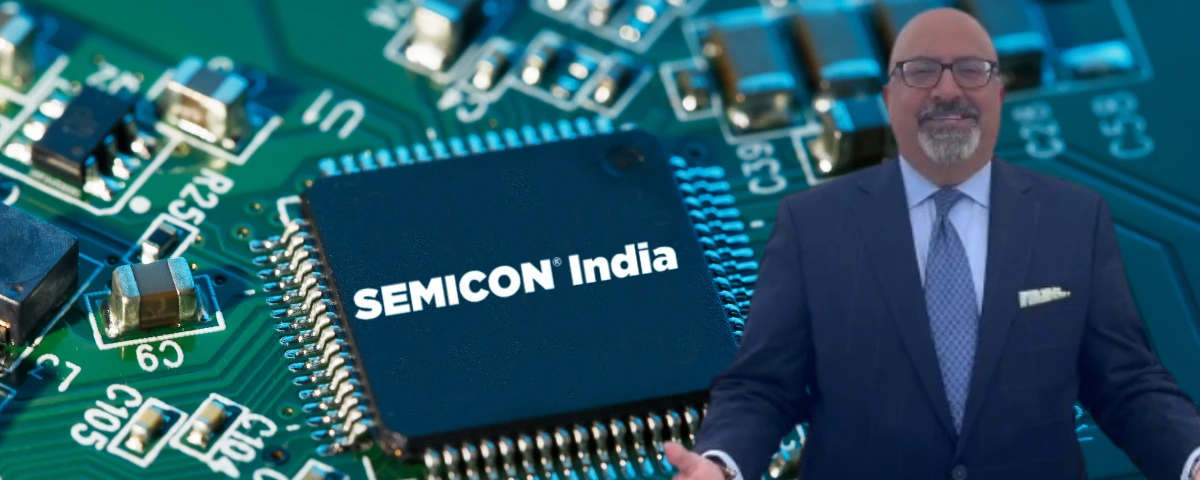Graphic showing a semiconductor chip labeled “SEMICON India” on a circuit board alongside USIBC President Atul Keshap.