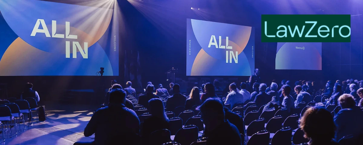 ALL IN 2026 conference audience in Montréal, with ALL IN and LawZero branding displayed on stage