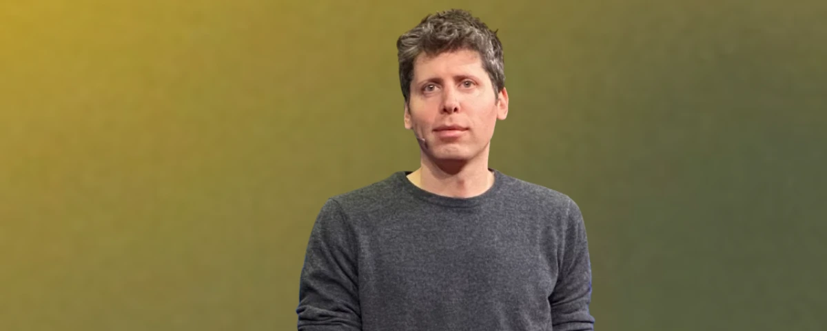 Sam Altman standing against a blurred green background.