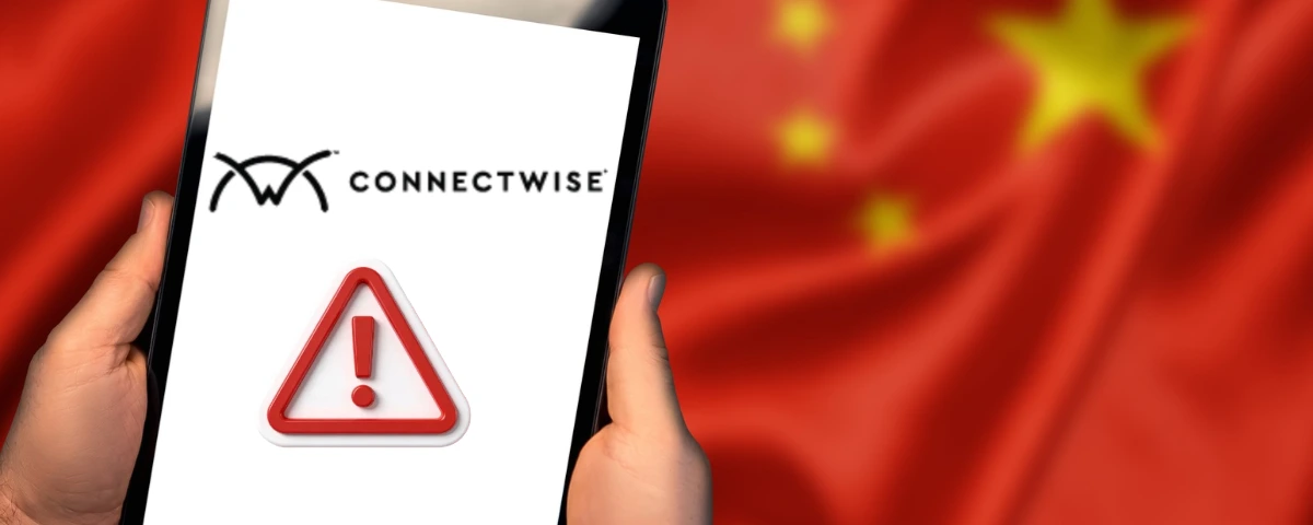 ConnectWise logo and warning symbol displayed on a smartphone against a Chinese flag background.